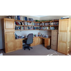 Home study with cabinets, desk top, drawers and shelves in Jacaranda wood